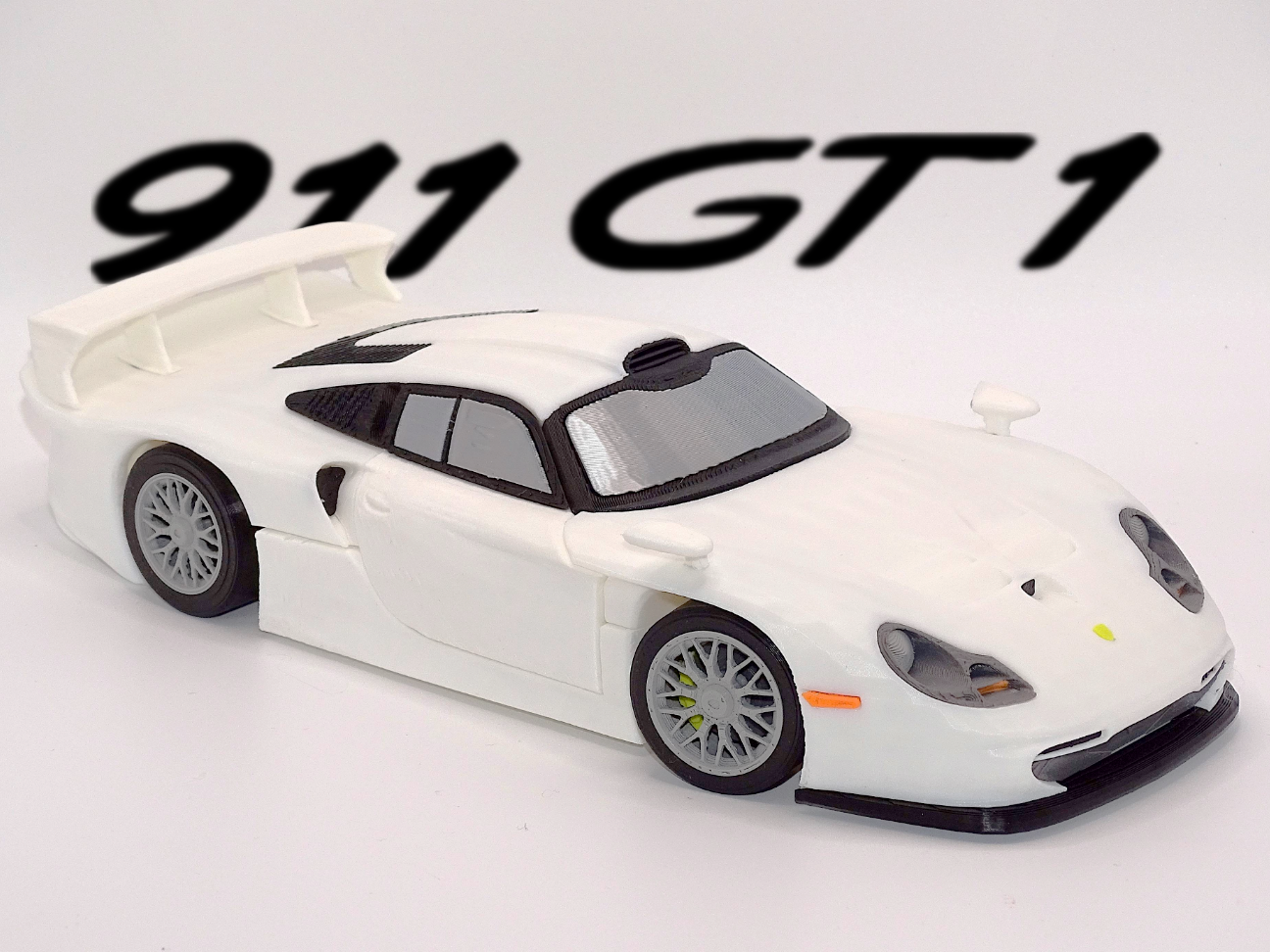Porsche 911 GT1 Straßenversion + Steer Scale 1:19