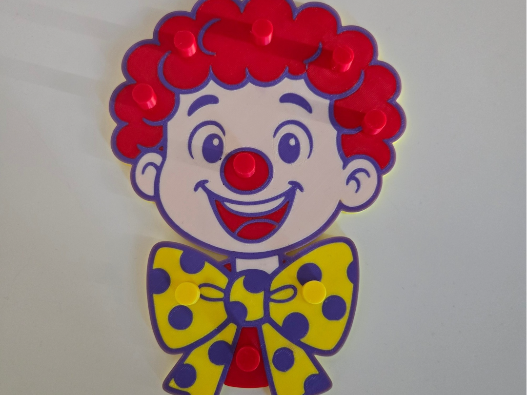 Clown à picots pour bouchon de compote