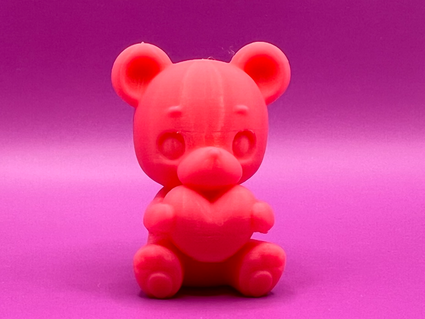 Bear holding heart