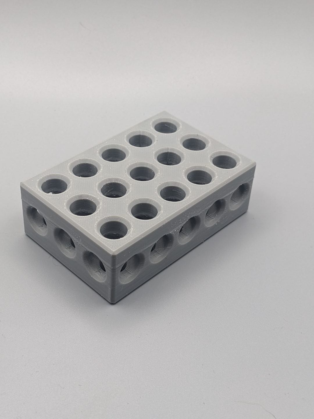 123 Block With 23 (3/8) Through Holes.