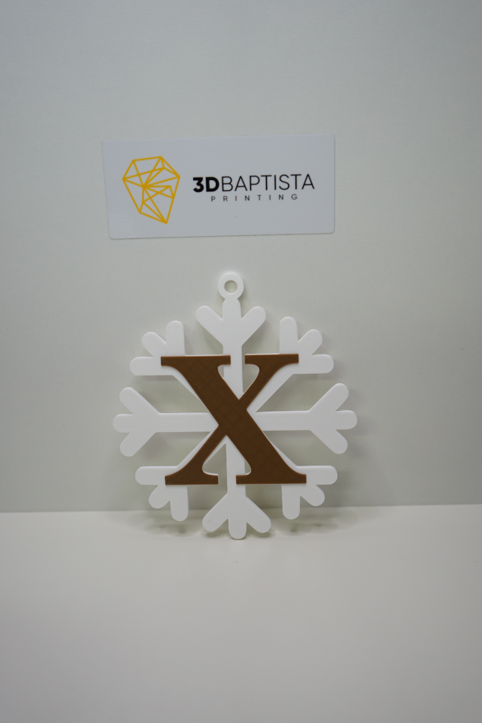 snowflake with letter X