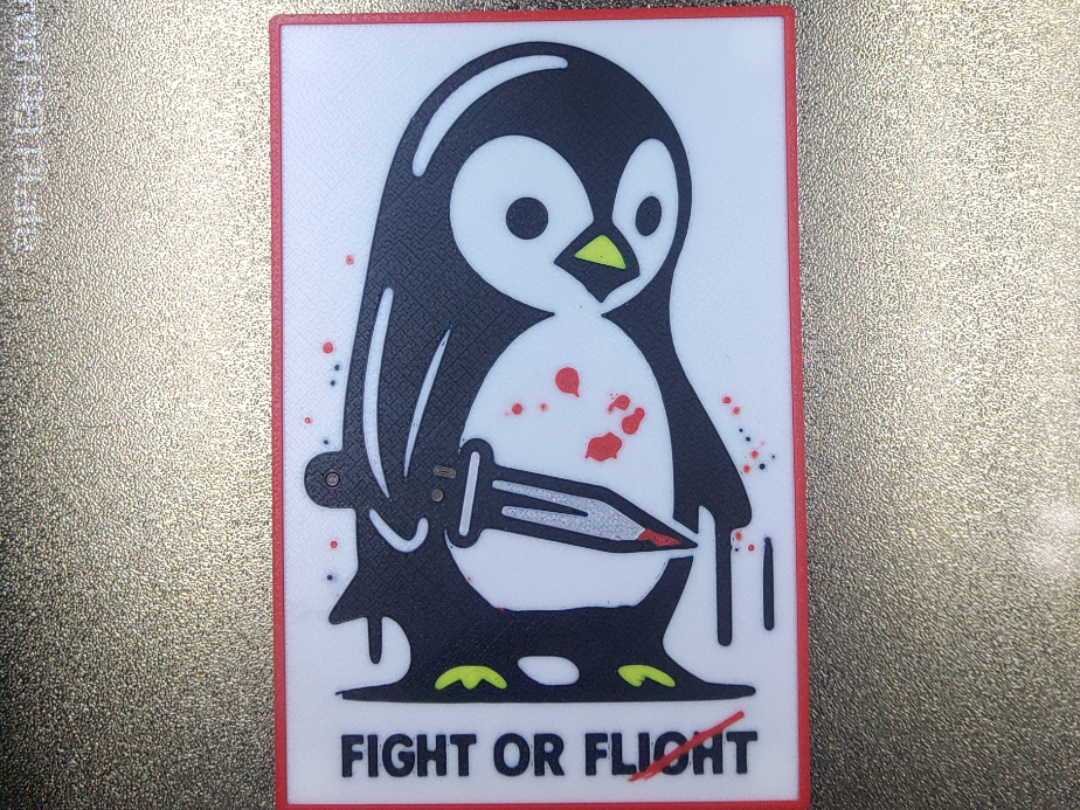 fight or fight penguin fridge magnet