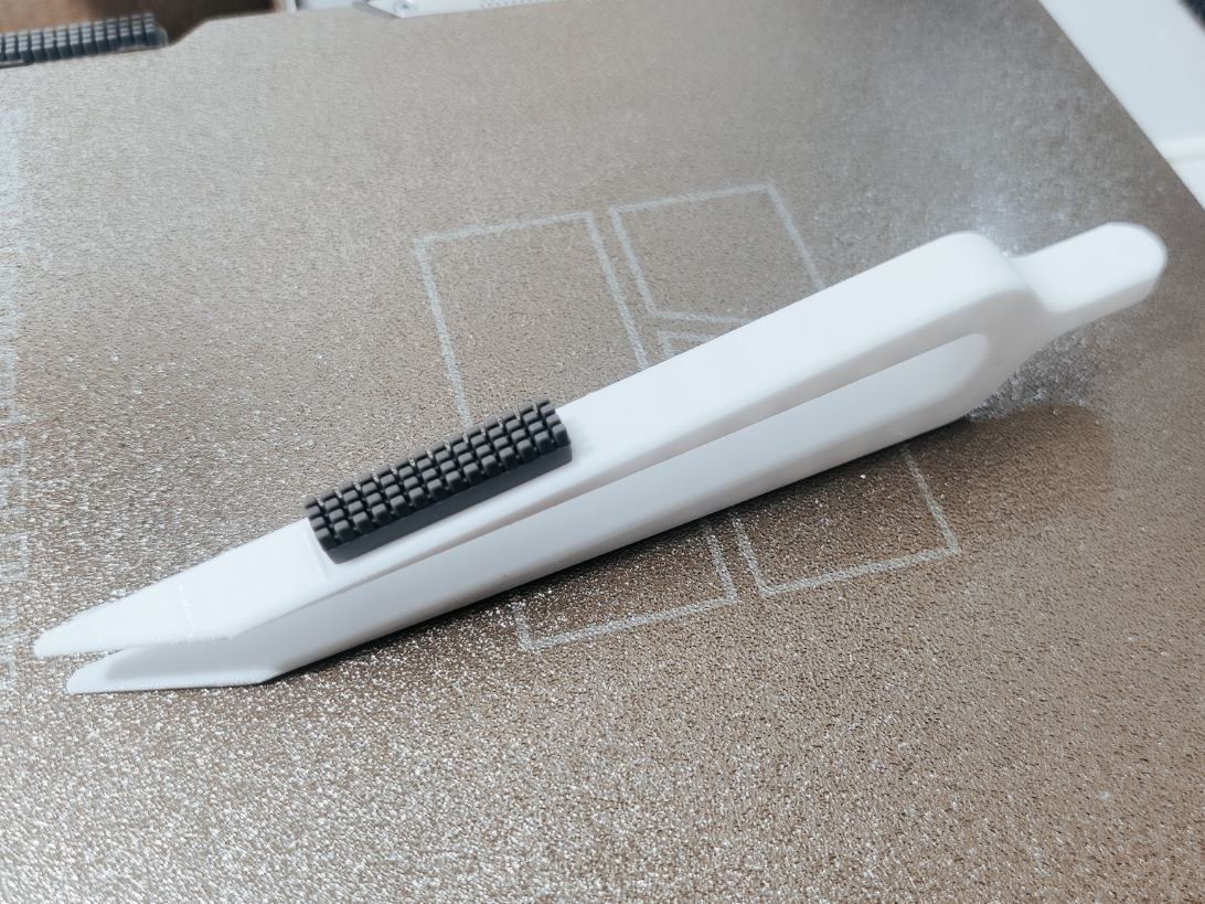 nozzle cleaning tweezers with silicon wiper