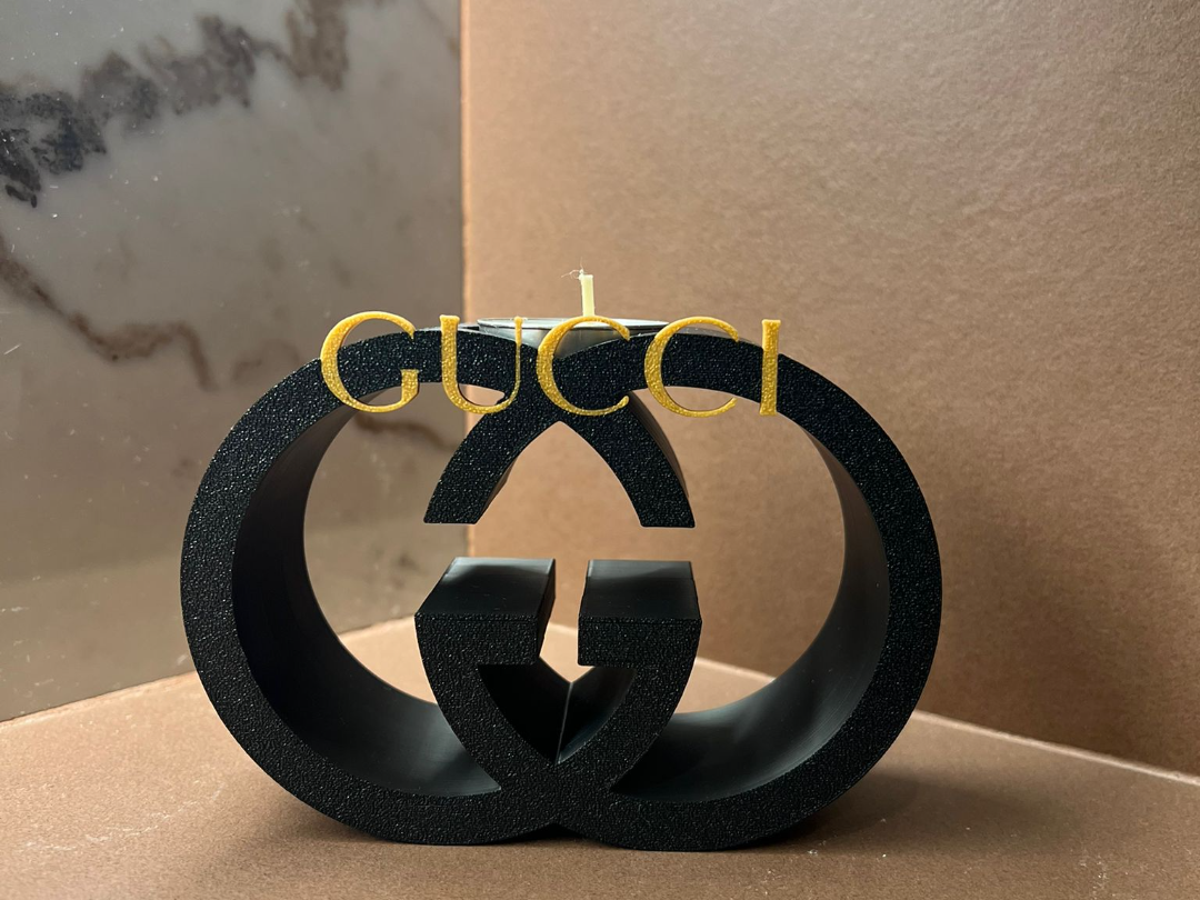 Gucci candela profumata con logo