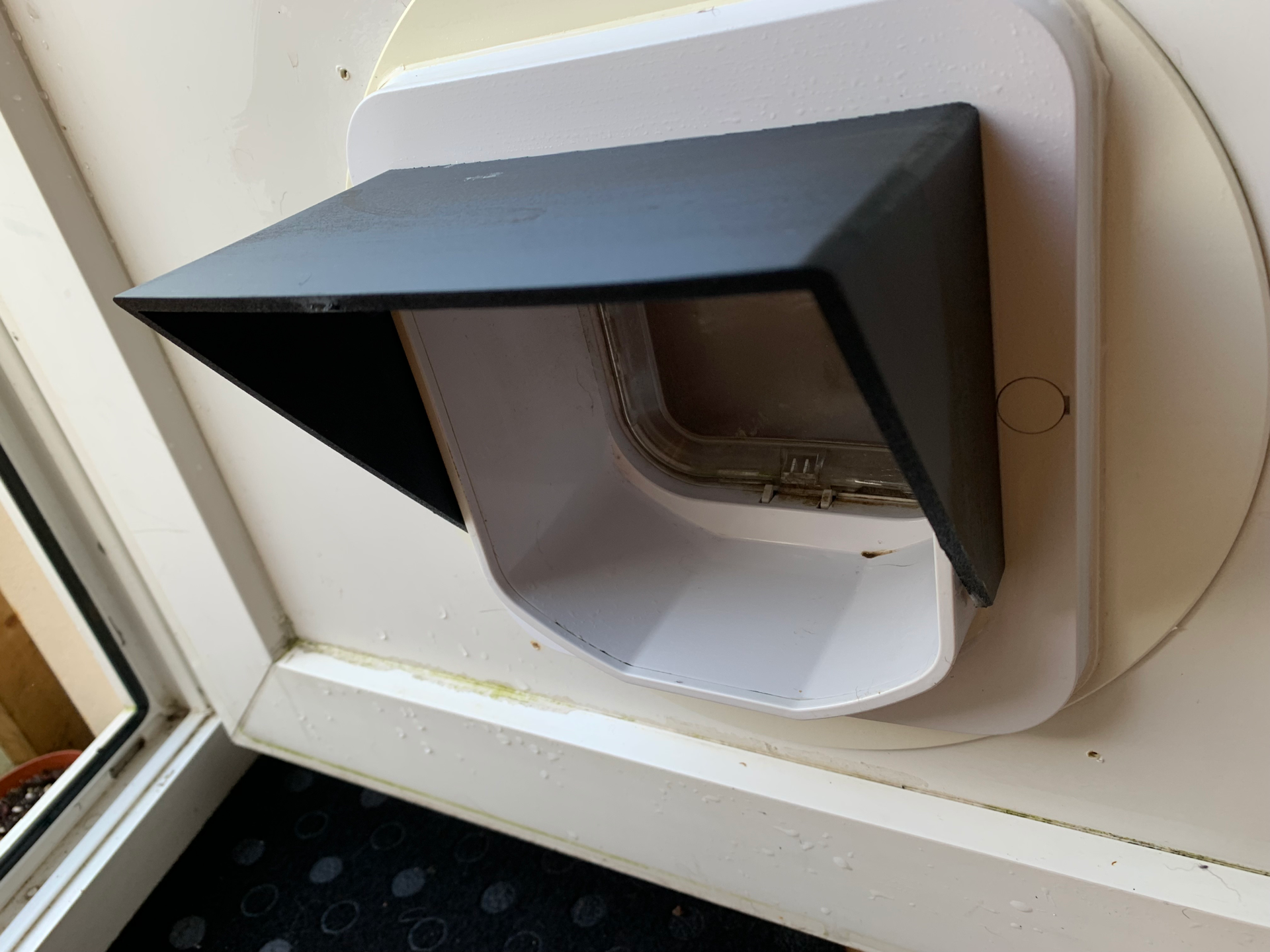 Cat flap rain cover