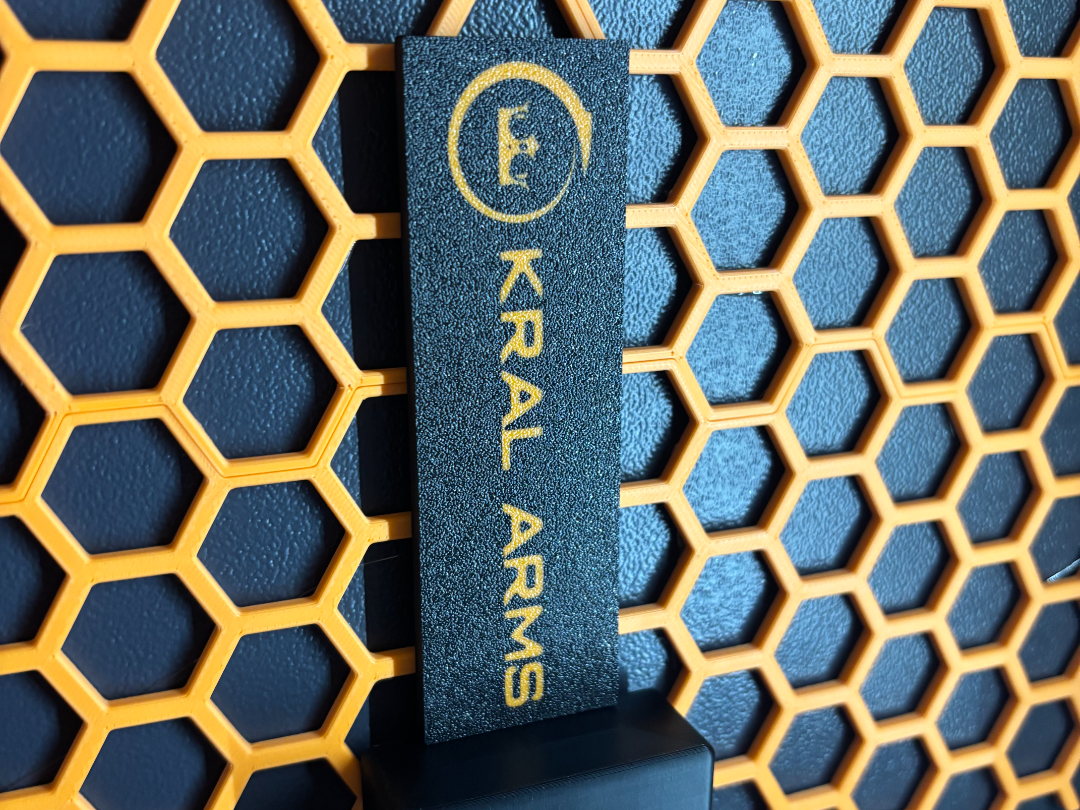 KRAL ARMS logo on a magnet