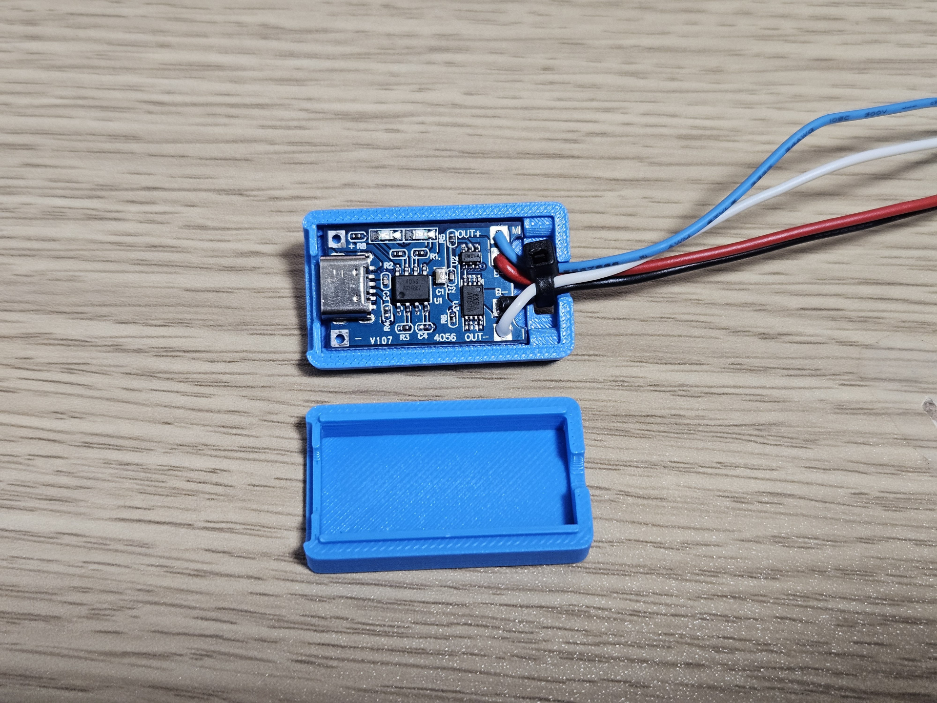 Case for TP4056 lithium charger with strain relief