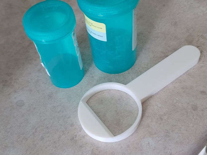 Pill Bottle Opener Lever