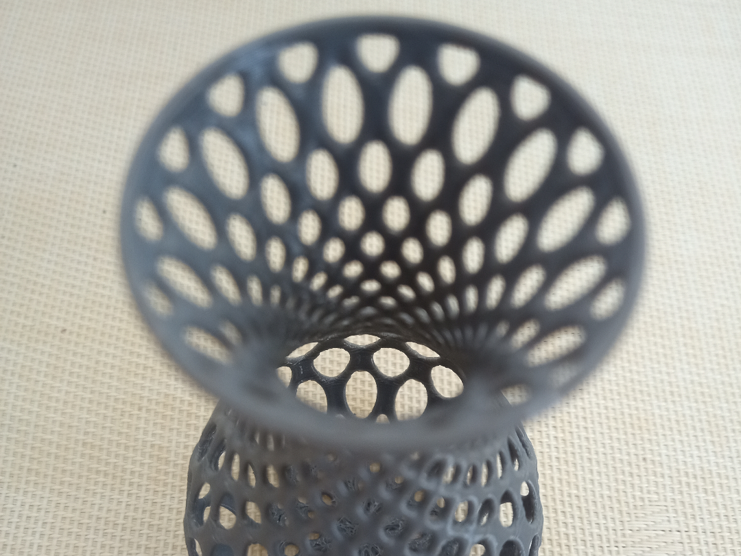 Vase with oval holes for cottonweed