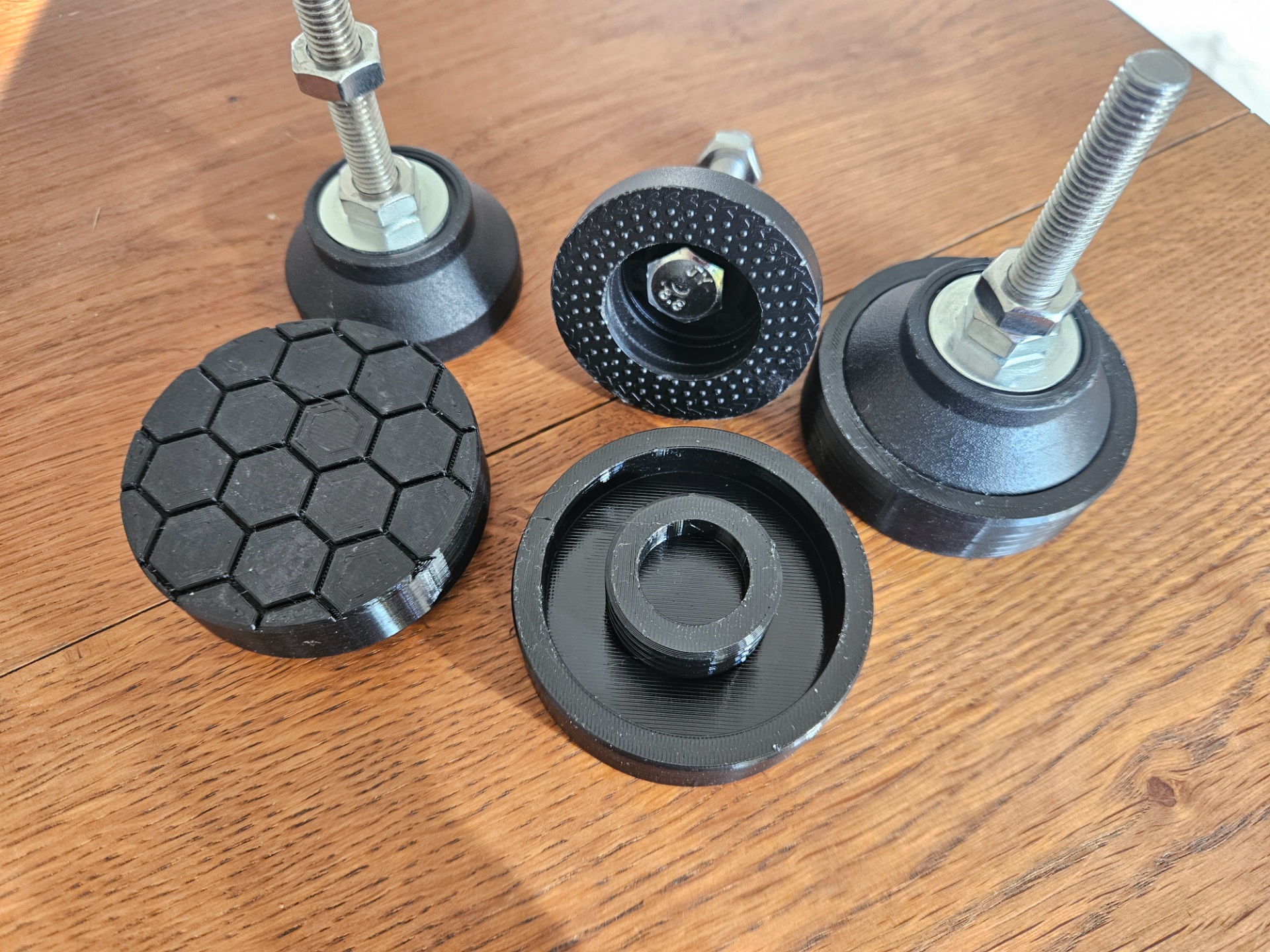 Anti-slip vibration dampers for adjustable feet