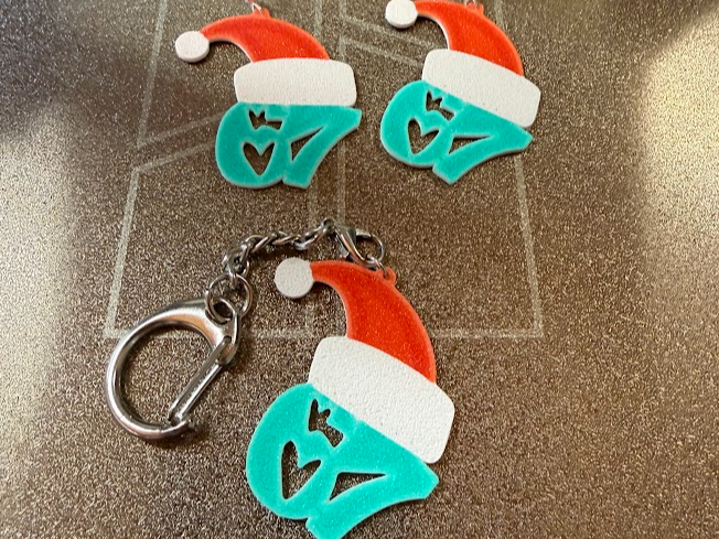 67 earings or keychain