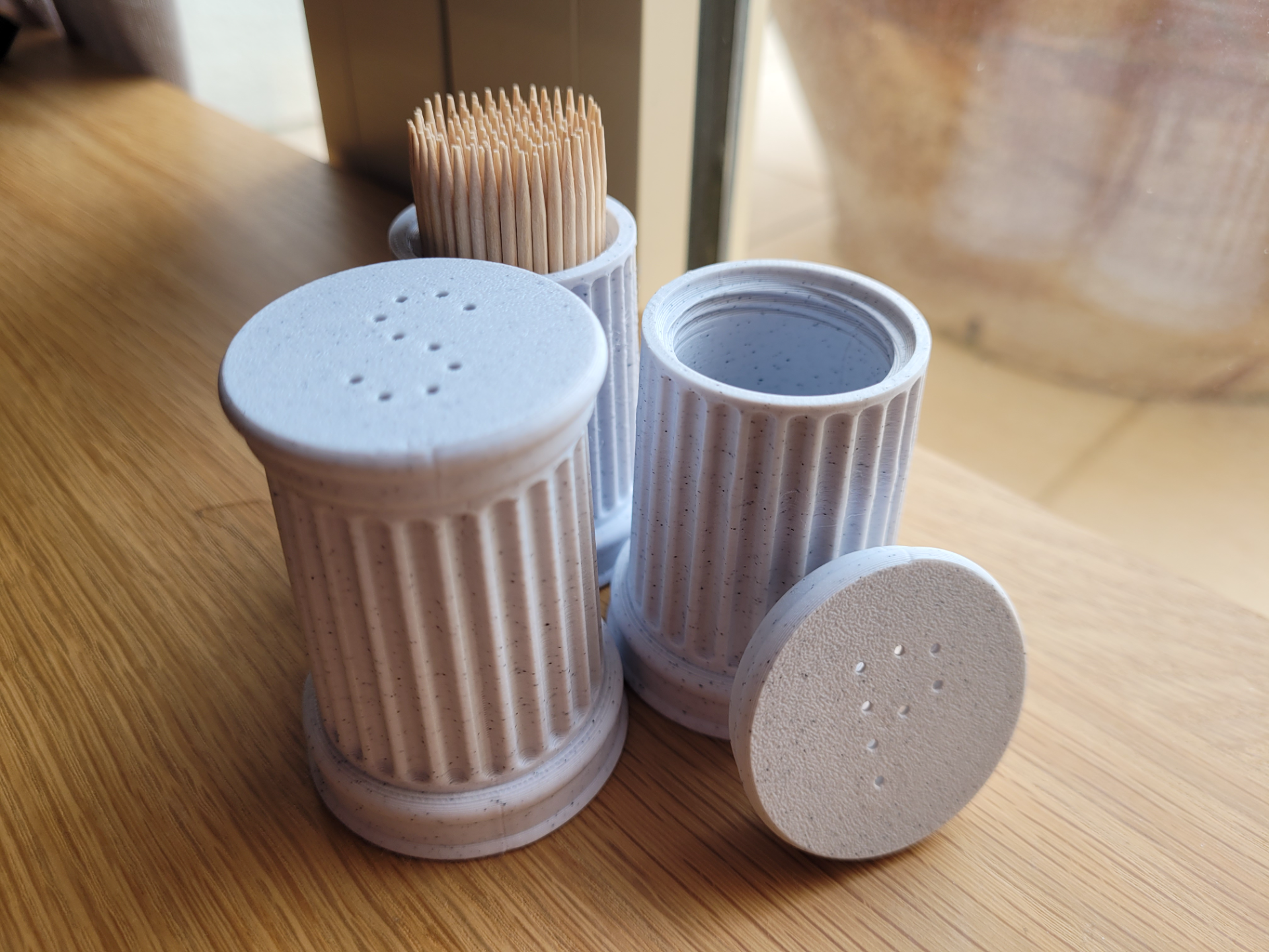Salt and pepper shakers roman/greek style