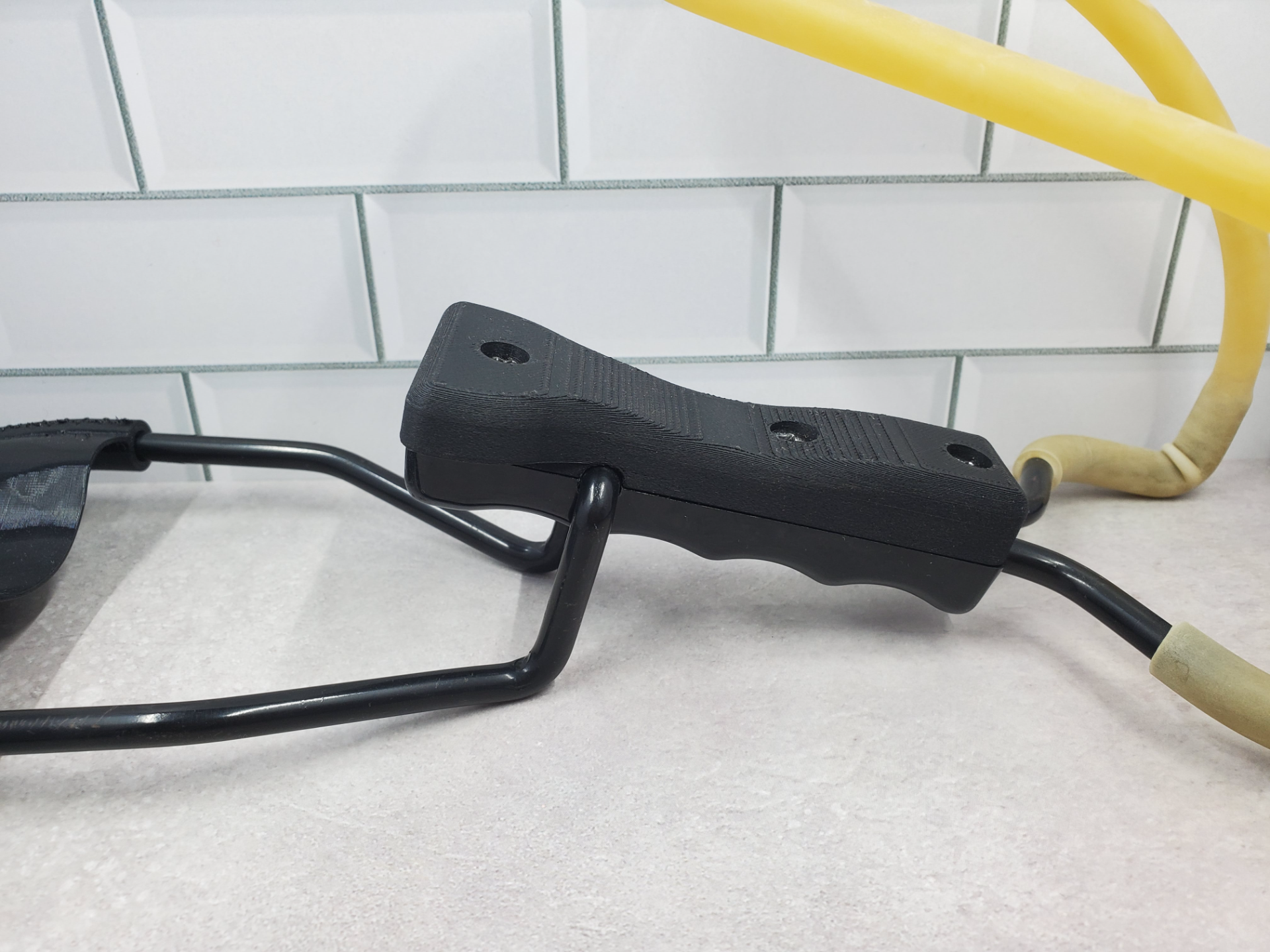 Custom replacement grip for daisy B52 slingshot.