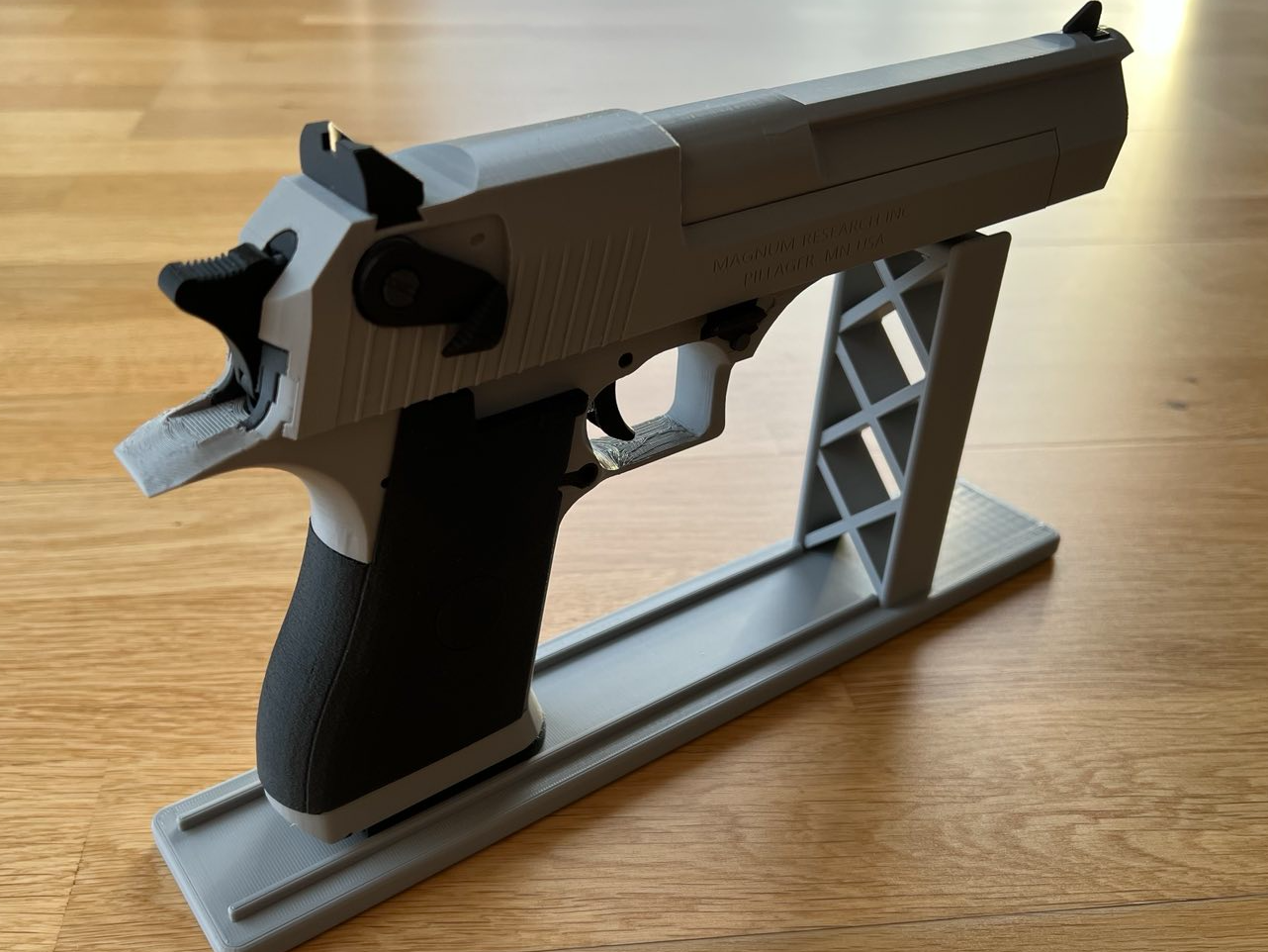 Desert eagle display stand