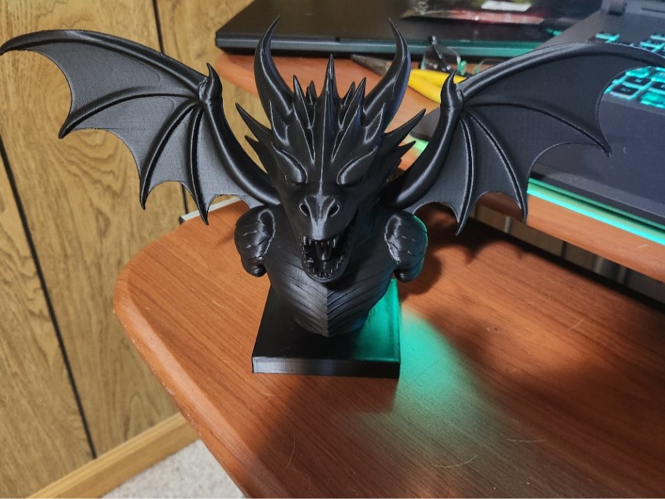 Dragon bust with outstretched wings