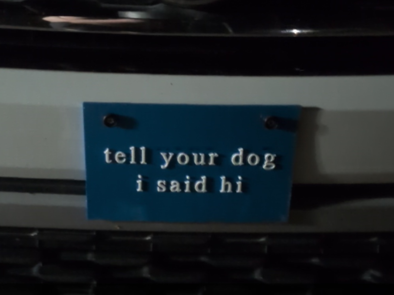 Tell your dog i said hi front plate