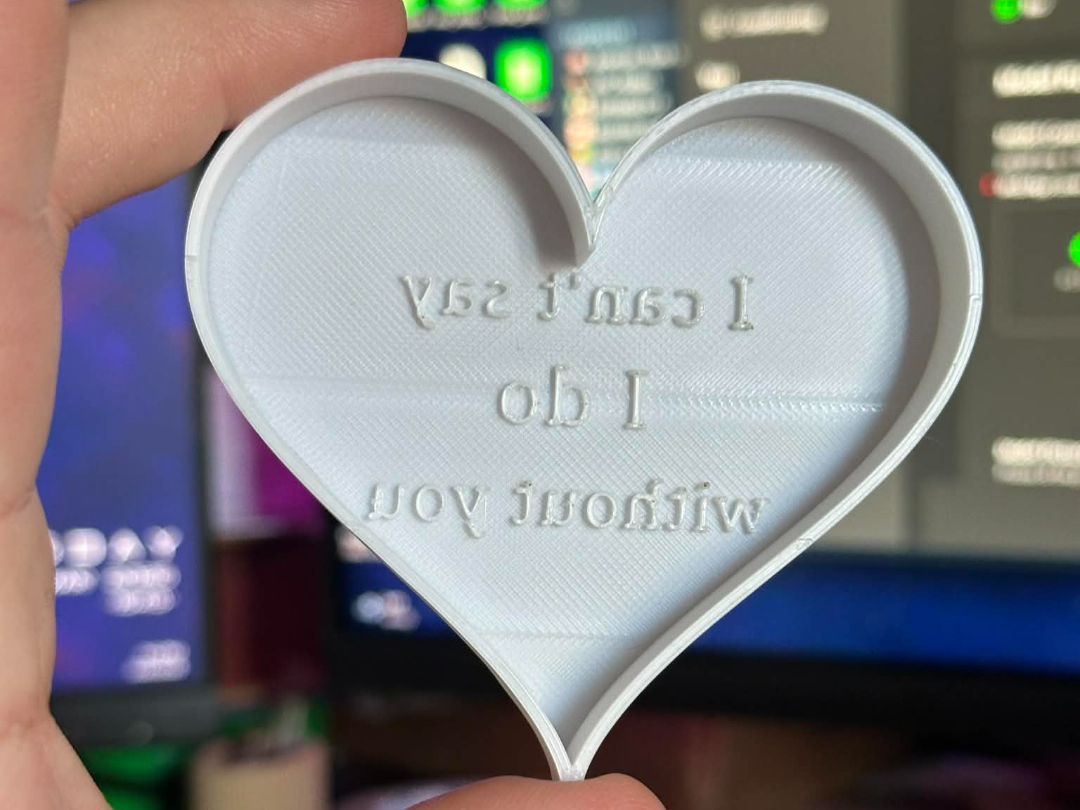 Heart shaped cookie cuttier with text