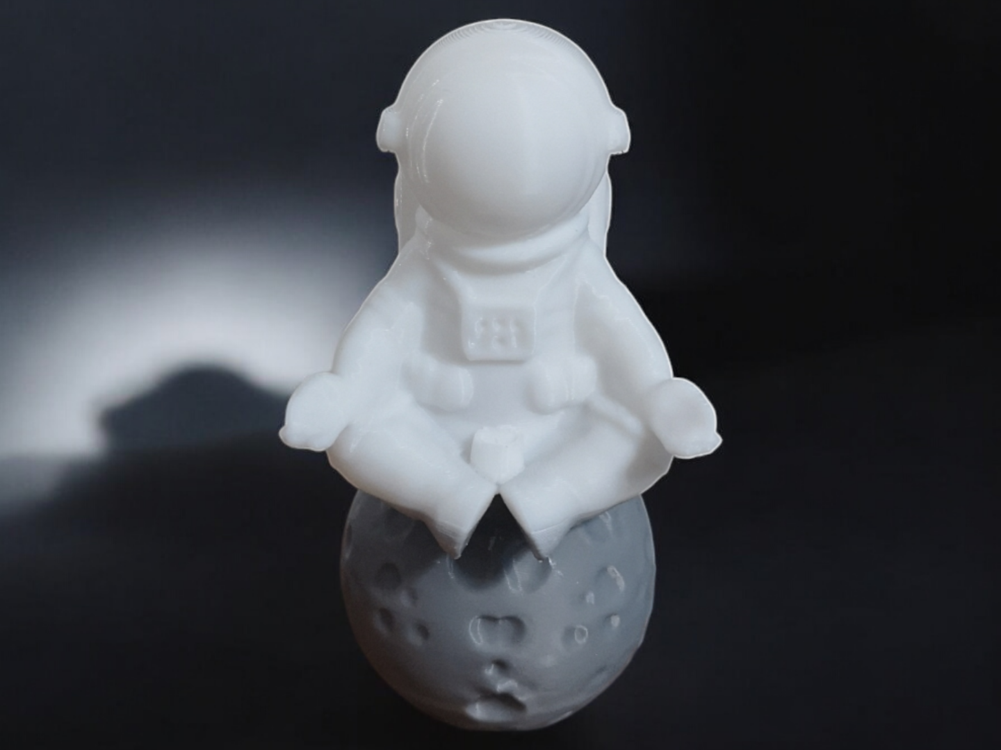 Meditative Astronaut on a Mini Moon