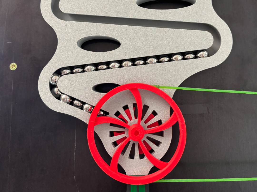Belt driven Marble Dispenser