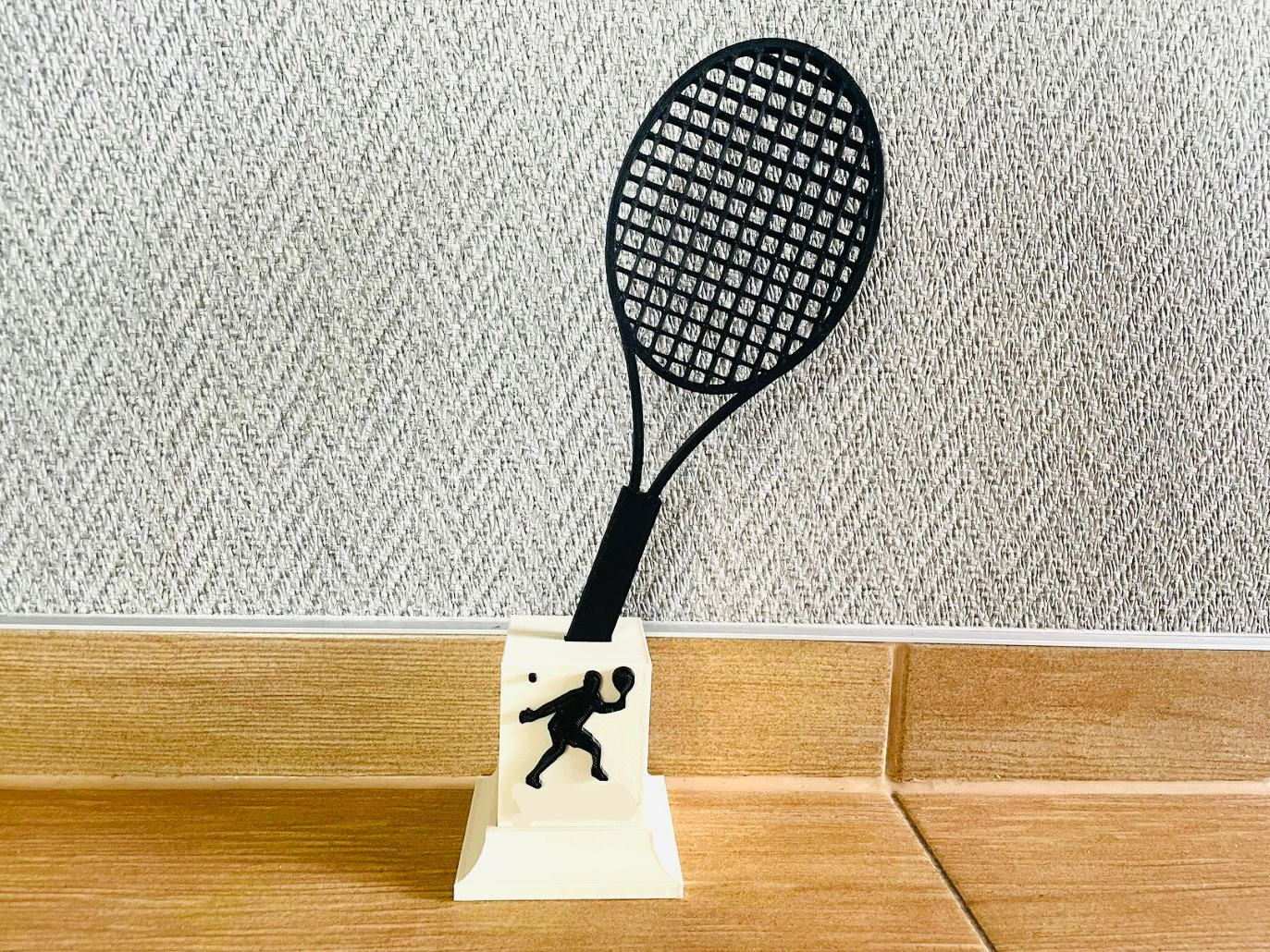 tennis racket statuette