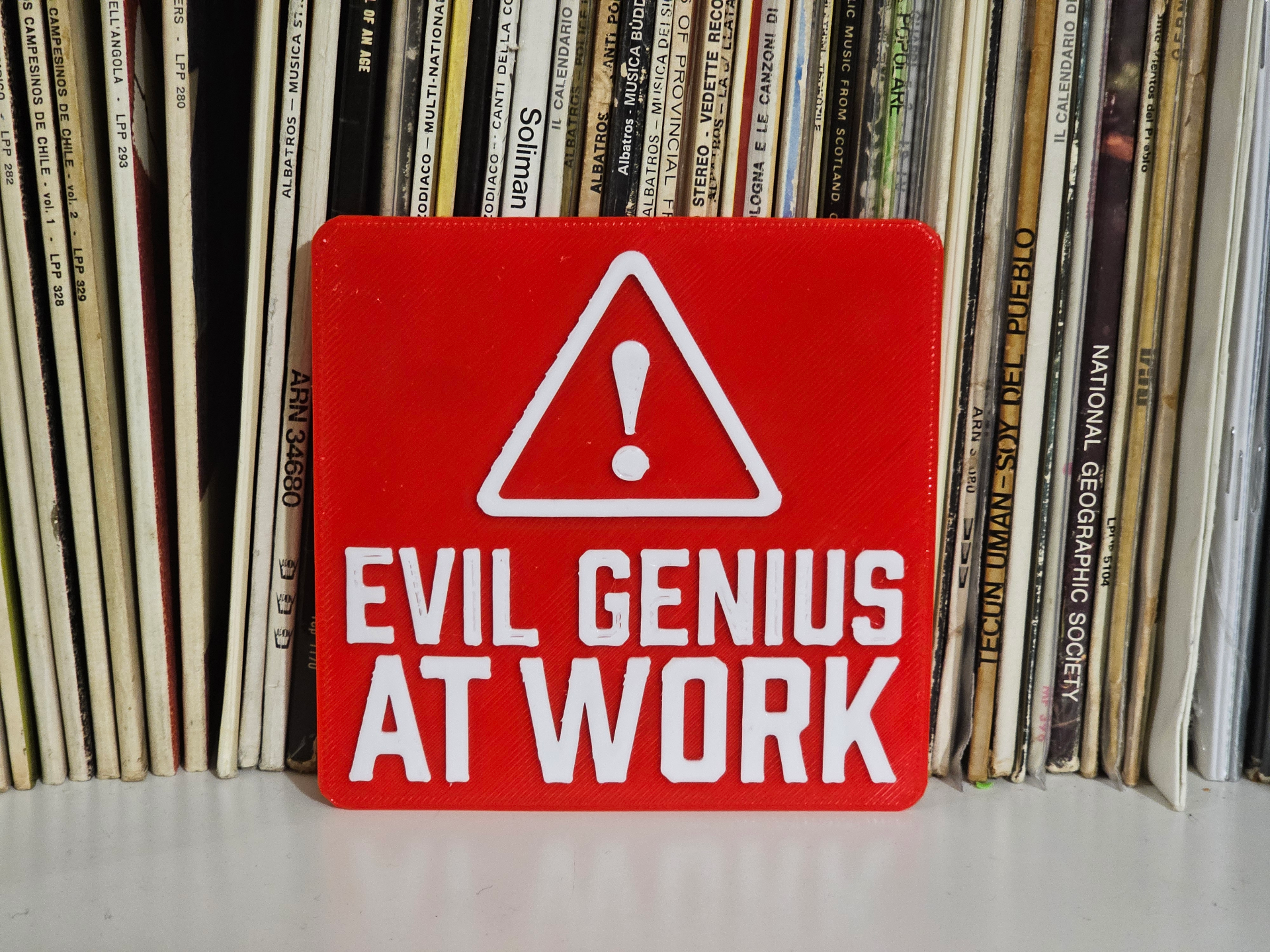 Evil genius workplace sign