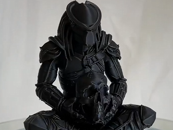 Predator sitting cross-legged