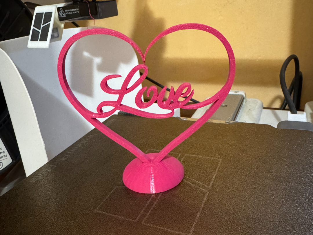 a heart with the word love