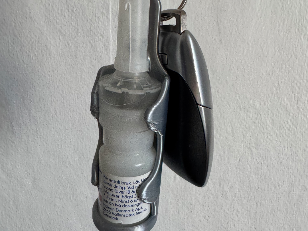 Nasal spray holder