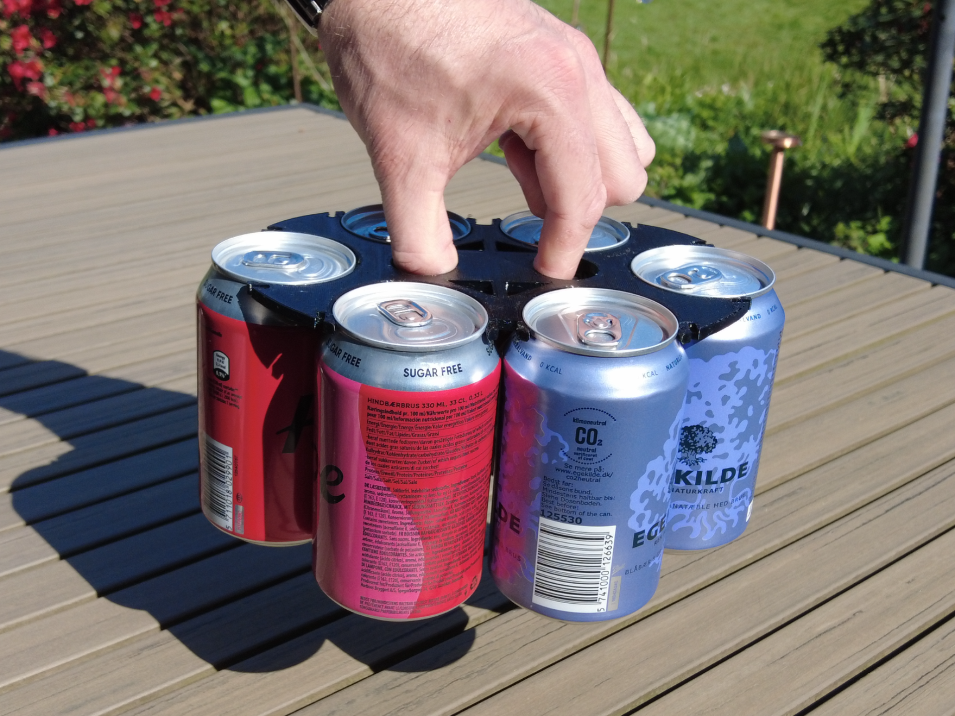 Holder for 4 or 6 cans. Simple and fast to print.