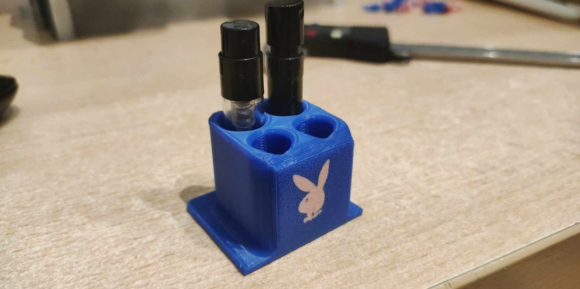 Playboy perfume sample stand