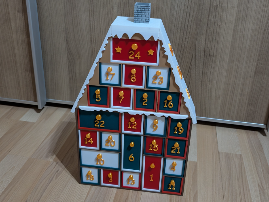 3D advent calender form of a house with 24 Boxes