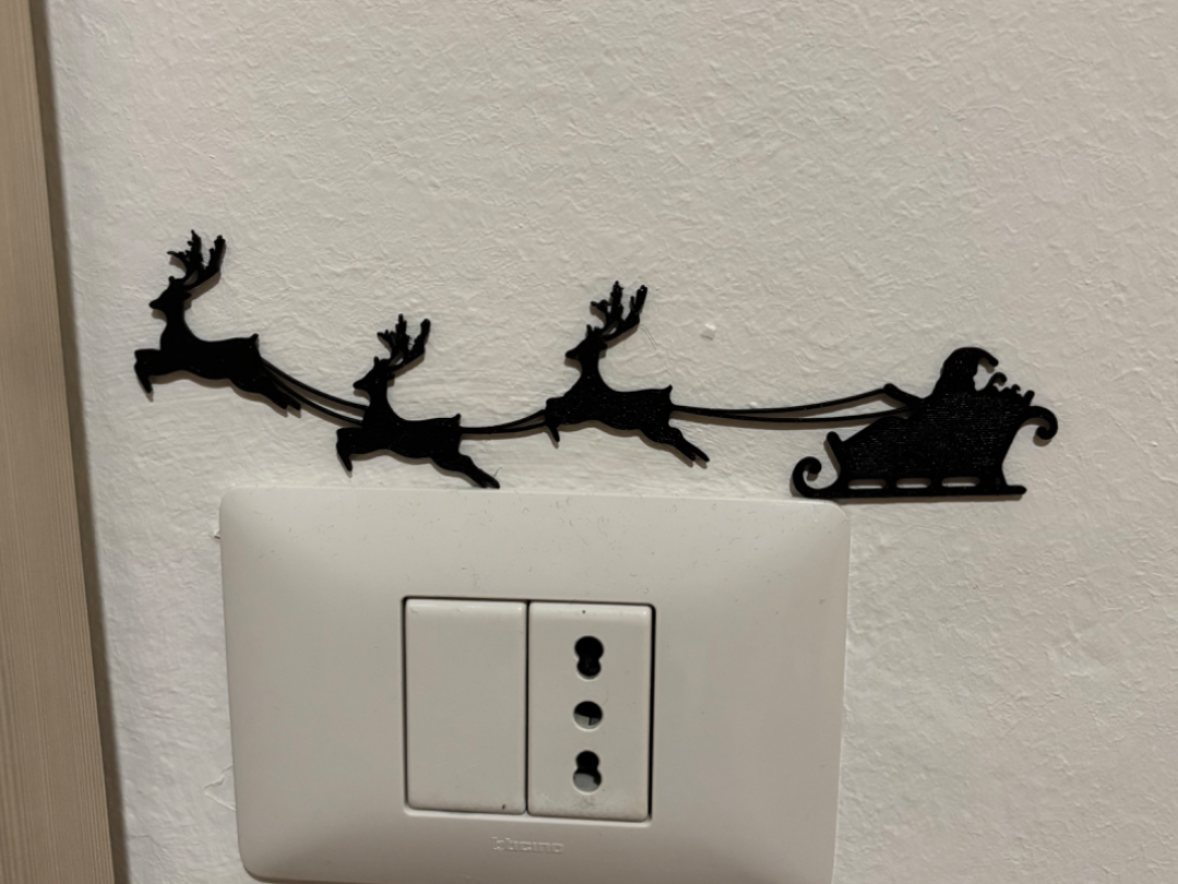 Babbo Natale sulla slitta con le renne
