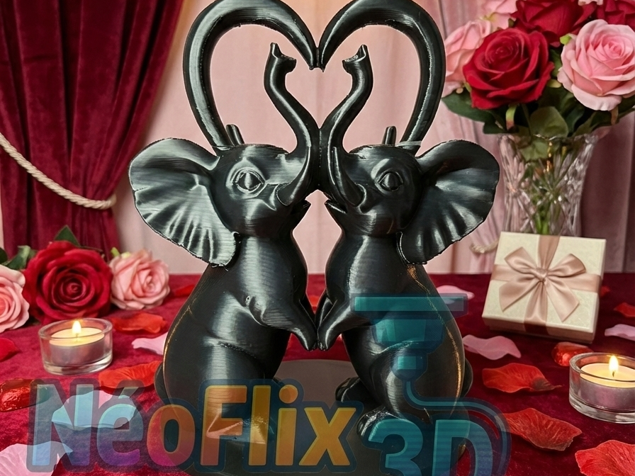 Éléphants amoureux – cœur 3D (trompes levées)