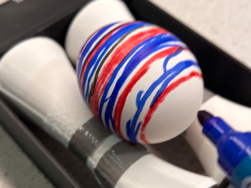 Easter motorized egg roller for painting