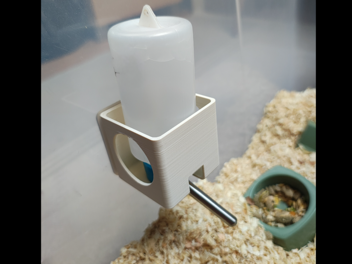Magnetic hamster water bottle holder