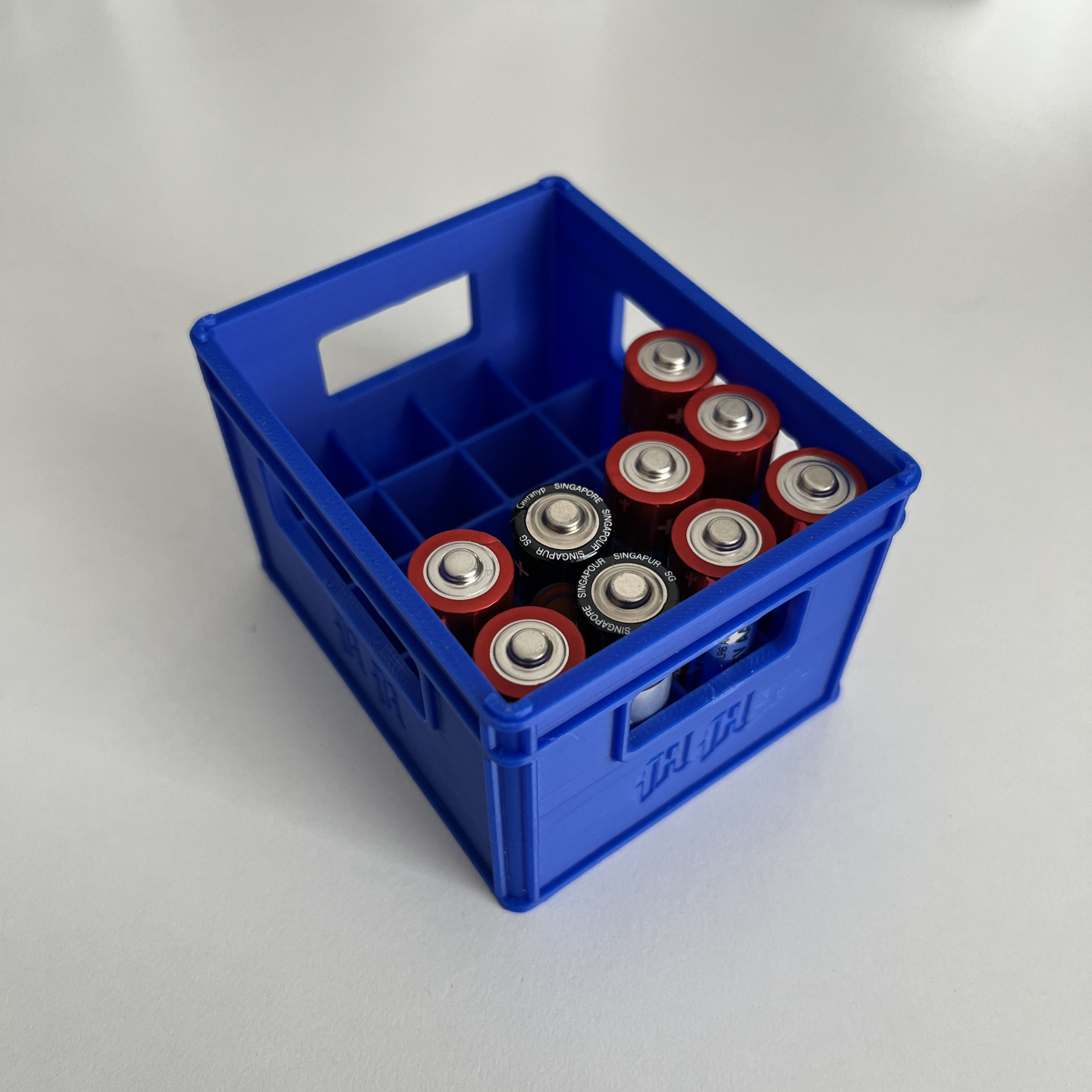 Battery (beer) carrier stackable for AA batteries.