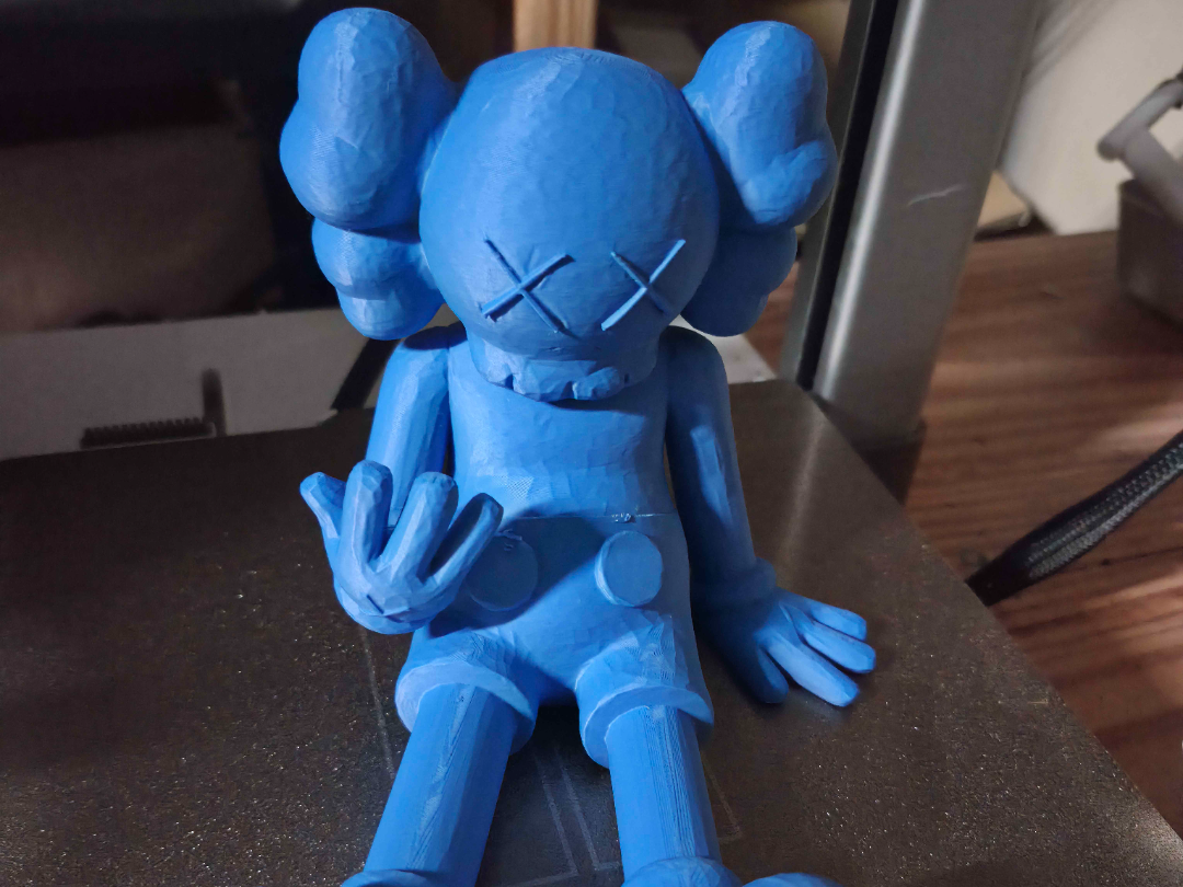 Sitting KAWS companion figure