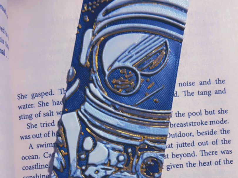 Golden Astronaut Camera Bookmark