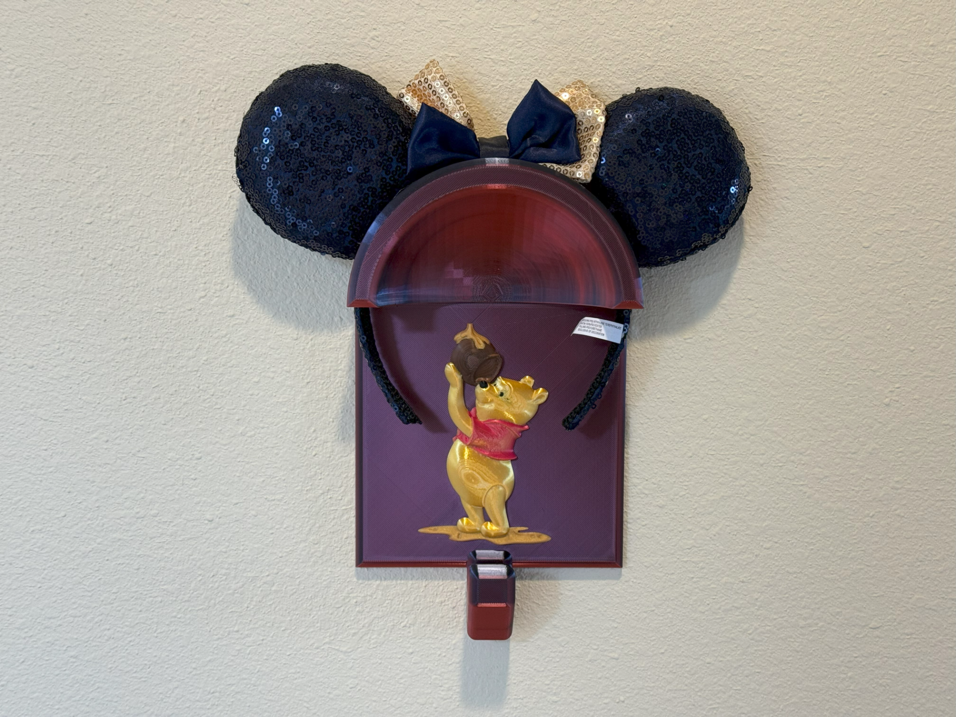 Winnie the Pooh ear wall display & backpack hanger