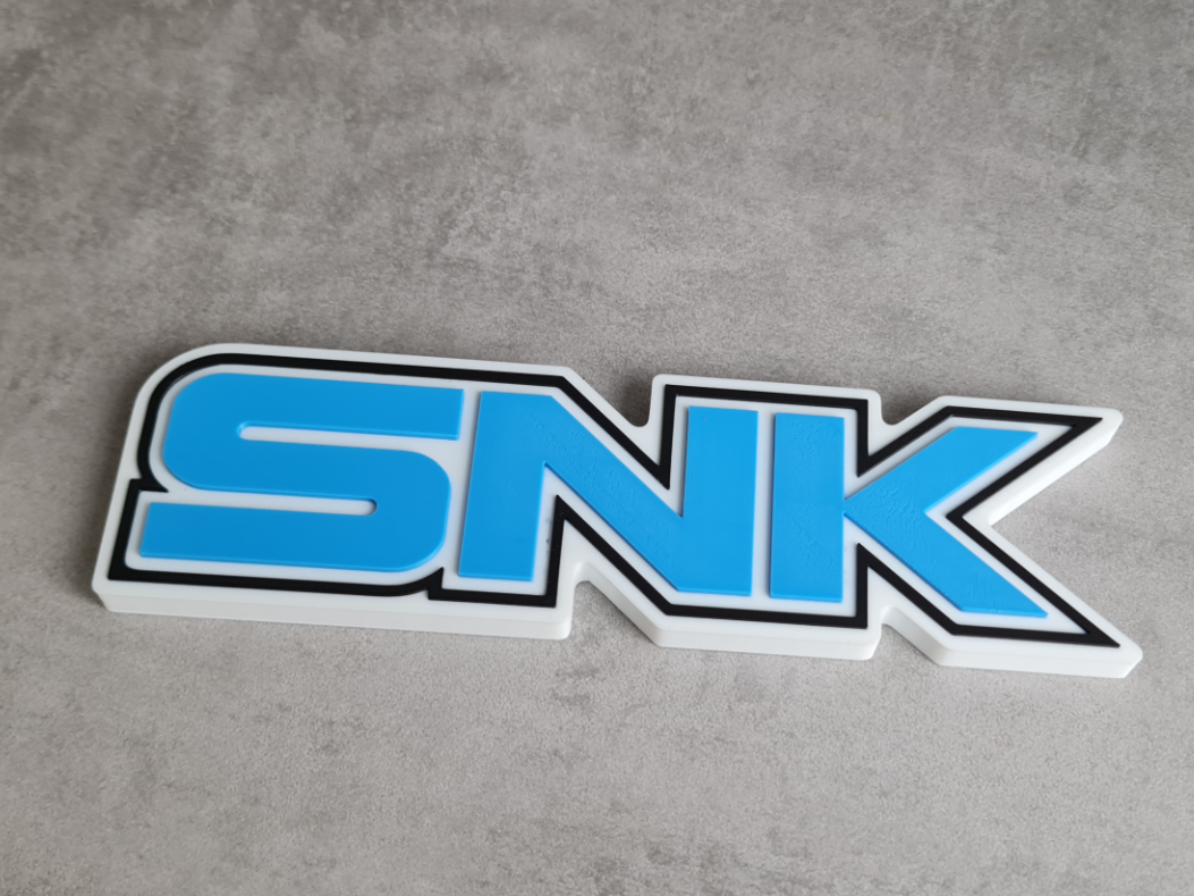 SNK logo / sign