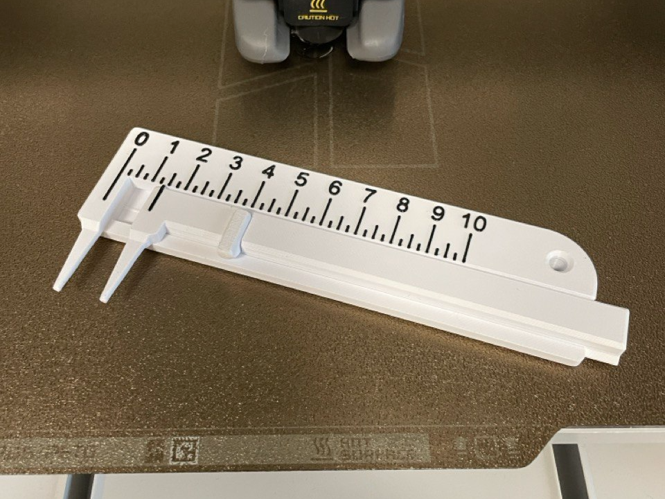 Hole spacing gauge