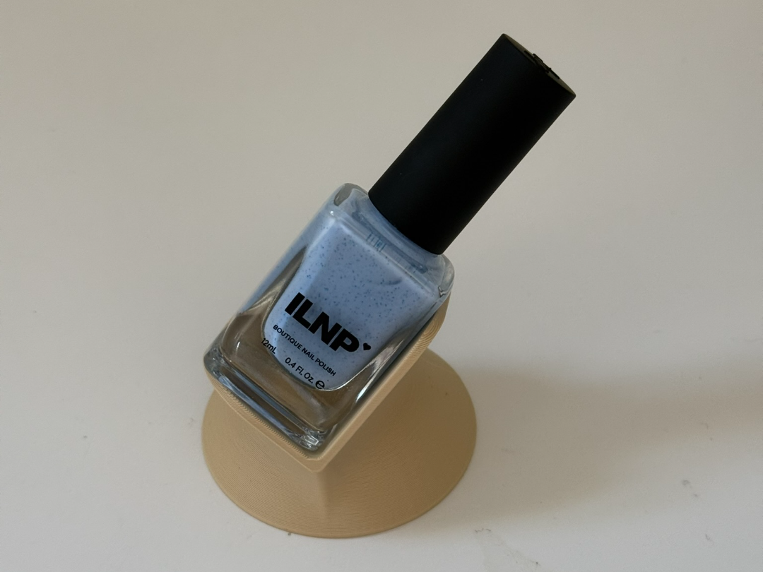 Nail polish bottle holder stand for square bottles