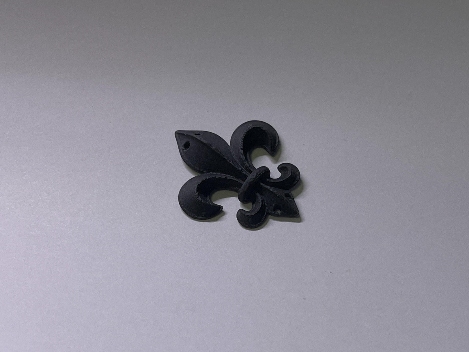 Fleur-de-lis button
