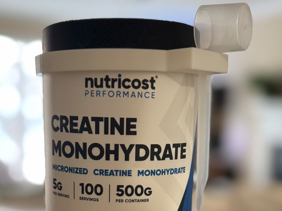 Nutricost Creatine Scoop Holder 17.9 Oz Tub