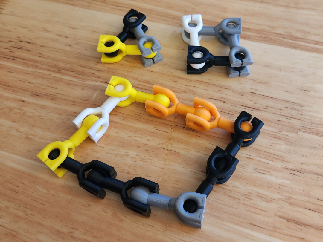 Chain fidget toy with ball and socket