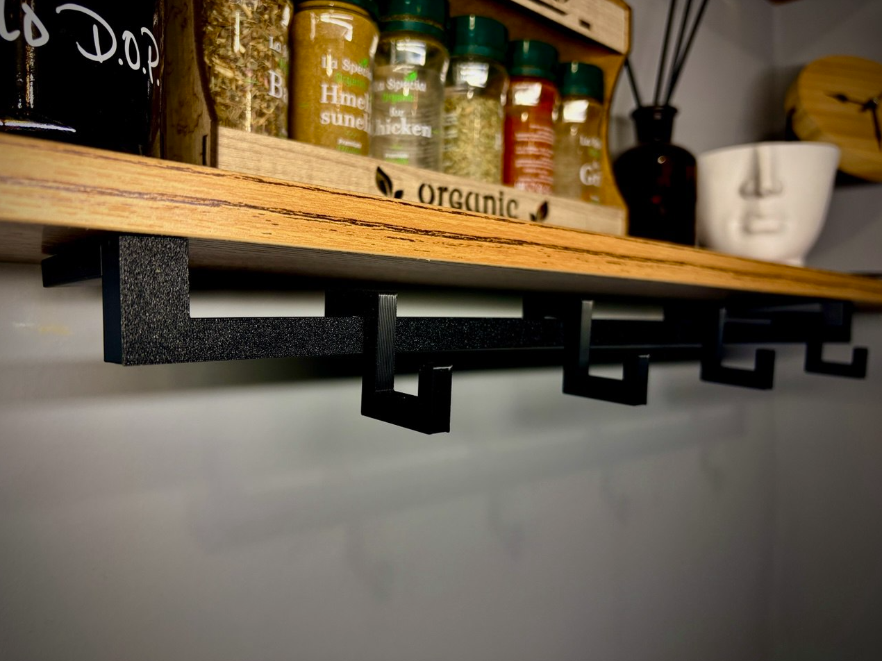 Kitchen railing with hooks