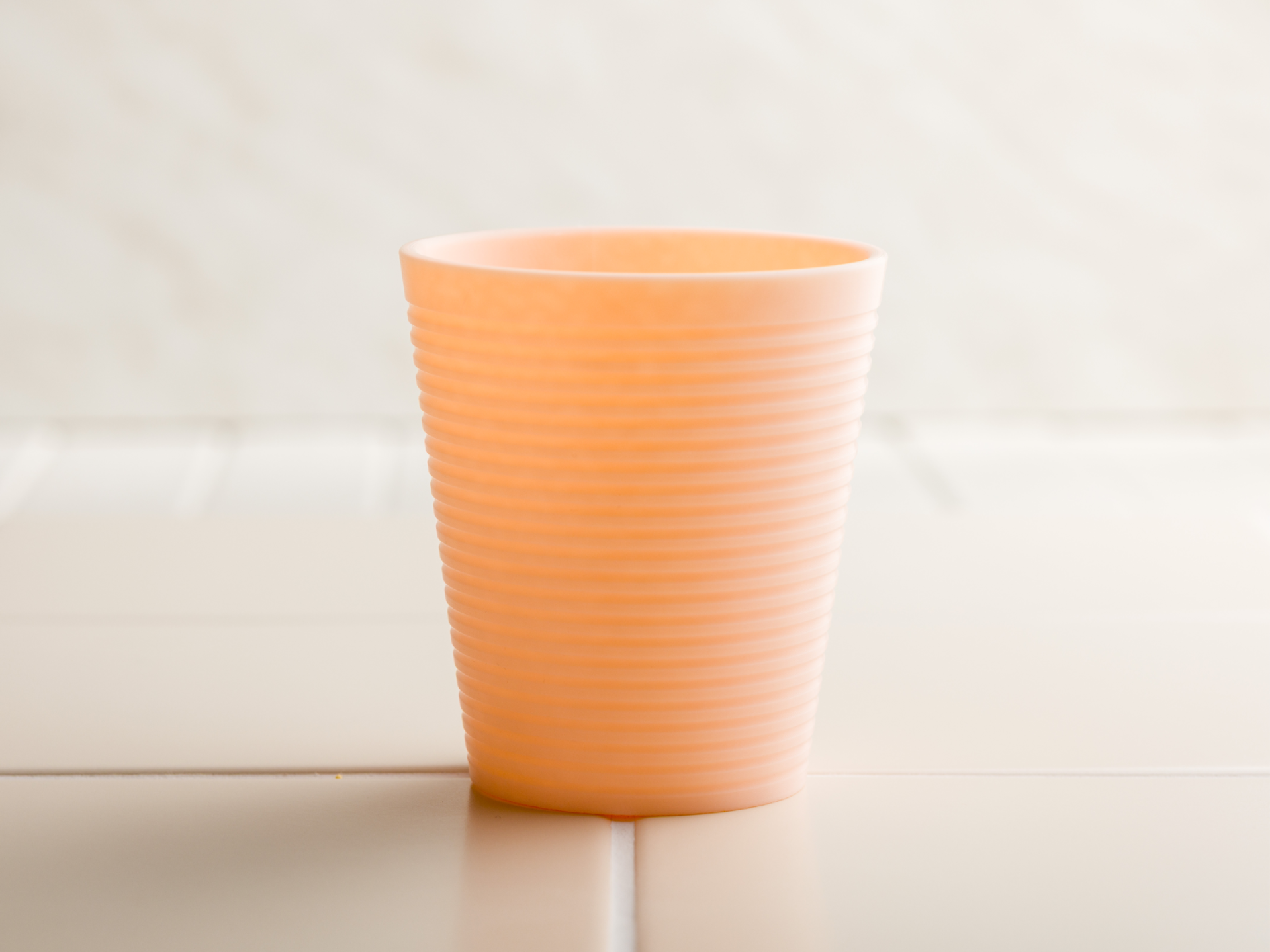 Cup with horizontal stripes.
