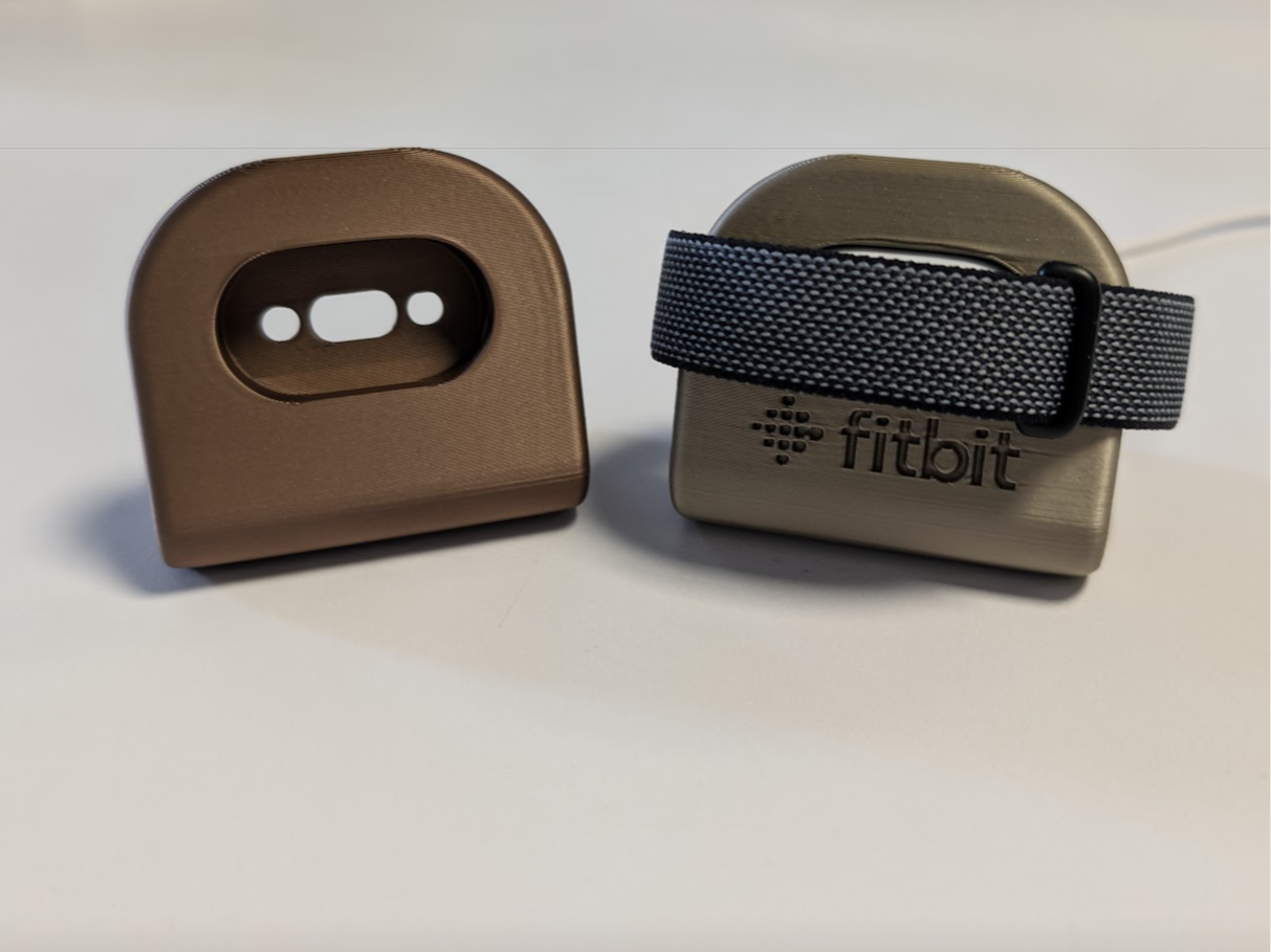 Fitbit Air charging base with cable routing