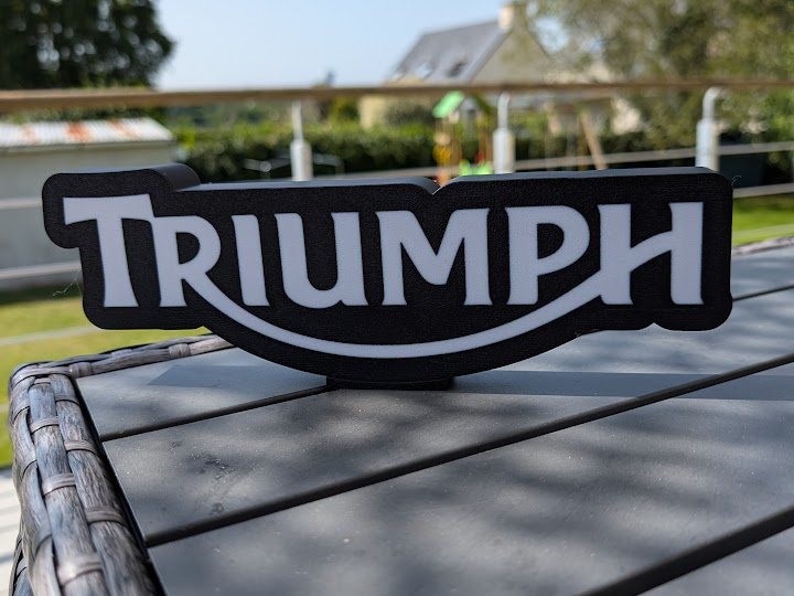 lightbox triumph logo modern