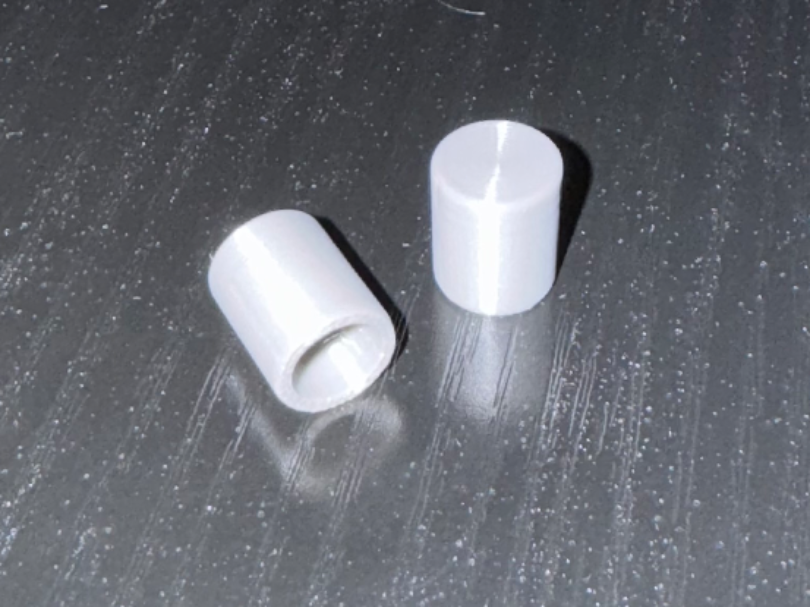 Cap for liquor bottle spout